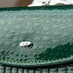 Маленький лаковий гаманець зеленого кольору Bretton
